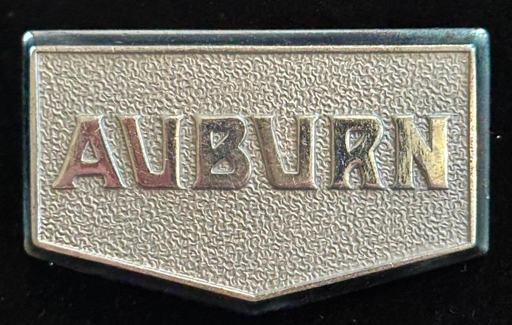 1931 - 1932 Auburn Radiator Emblem: 1931 - 1932 Auburn Radiator Emblem. This emblem has a Fox maker's mark and measures approximately 2.4" wide by 1.5" high.