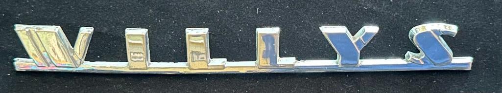 1940 Willys Hood Script: 1940 Willys Hood Script. This emblem measures approximately 6" wide by .6" high