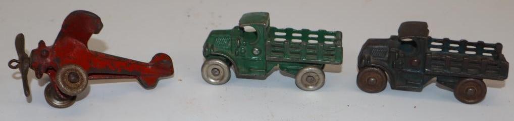 Group of 3 Cast Iron Trucks and Airplane (1 of 4)