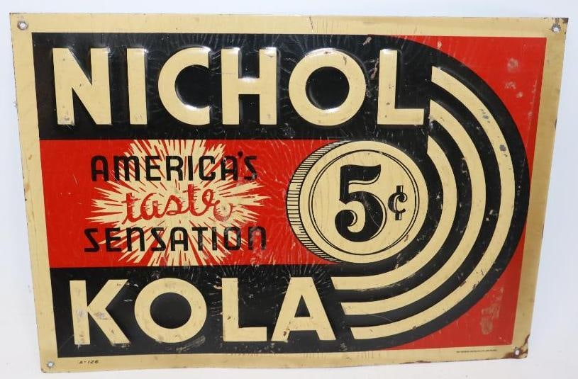 Embossed Nichol Kola Single Sided Sign: 14" x 10". It has paper marks. It is marked Parked Metal Dec Company