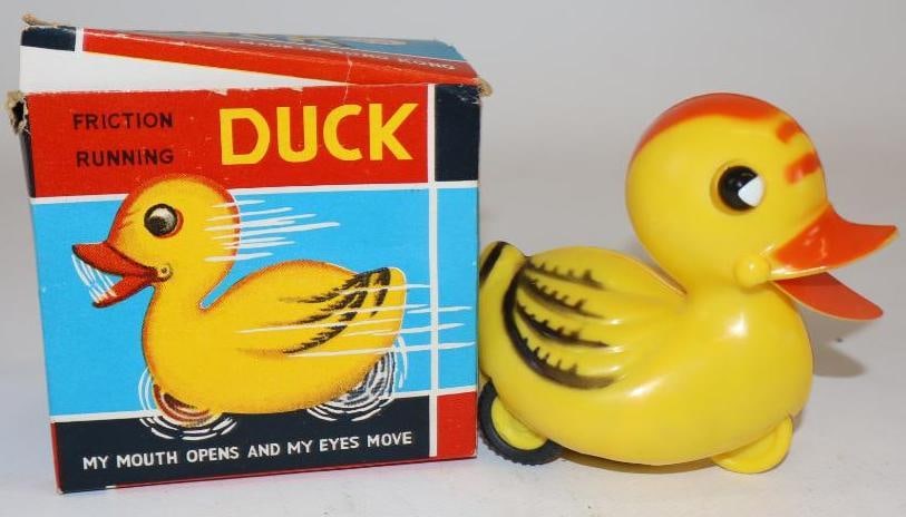 Friction Running Duck in Original Box: 3.5" x 3.5" x 2.5", box is marked made in Hong Kong