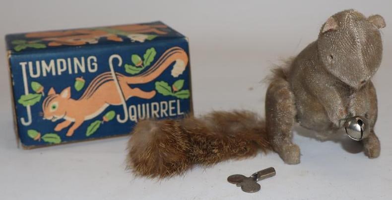 Jumping Wind Up Squirrel in Original Box: 2.75" x 4" x 2.5", is marked TM Modern Toys