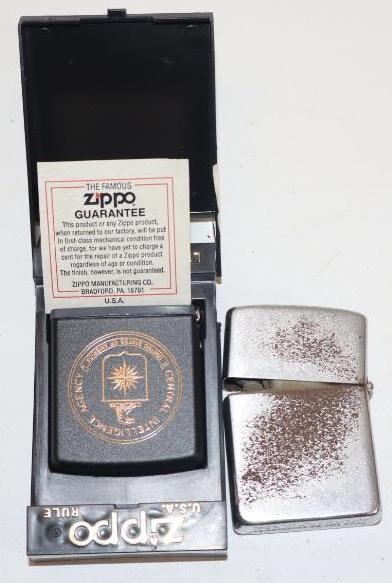 Group of 2 Zippo Advertising Lighter and Tape Measure: largest 1.5" x 2.25"