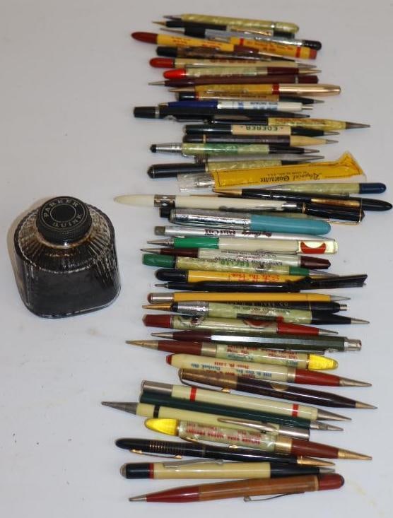 Group of 46 Advertising Pens, Pencils, and Inkwell: largest 2.5" x 2.5" x 2.5"