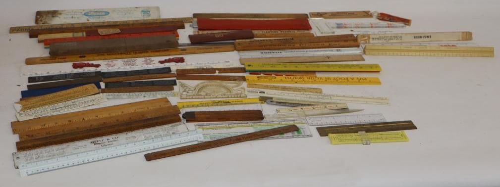 Group of 64 Advertising Rulers: Largest is 18" x 2"