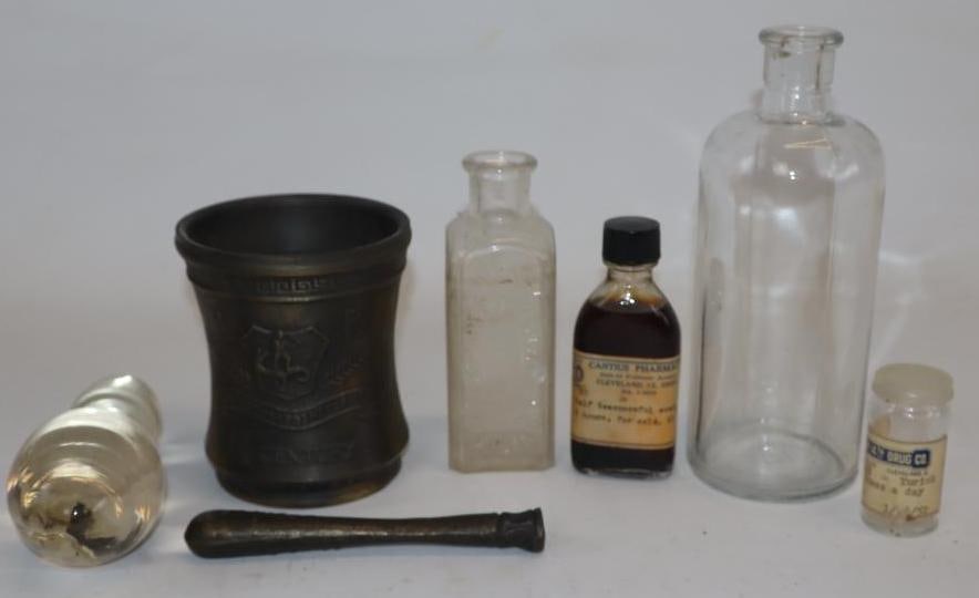 Group of 7 Pharmacy Related Bottles and Tools Mortar and Pestle: Largest is 2.75" x 2.75" x 7.25"
