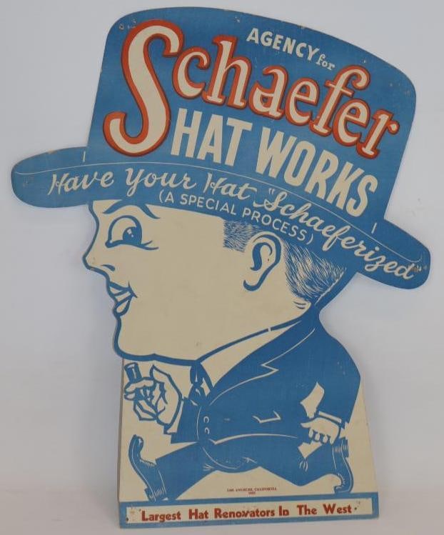 1923 Schaefer Hat Works Diecut Cardboard Display Sign: 18.5" x 22". Has many pin holes around the perimeter.