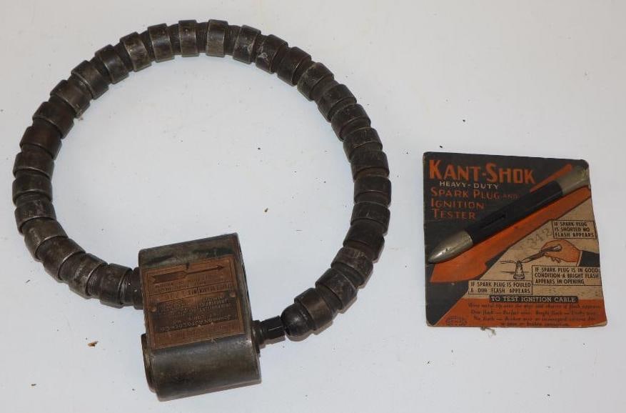 Group of 2 Kant Shok Spark Plug Testor and Johnson Spare Tire Lock (1 of 5)