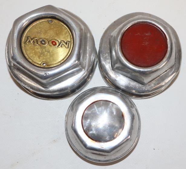 Group of 3 Aftermarket Threaded Hubcaps Moon: Largest is 3" thread diameter, moon emblem is not attached & measures 1.5" x 1.5"