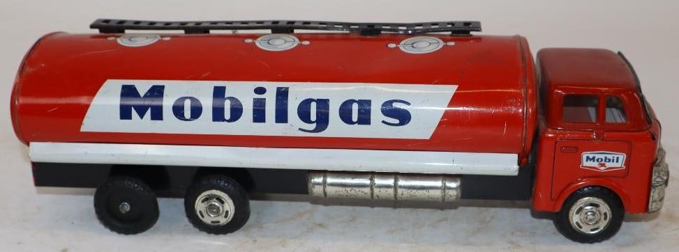 Mobil Gas Tin Litho Friction Toy Tanker Truck with Wind Up Hose: Friction works. Is marked Made in Japan. 12" x 3.25" x 3.5"