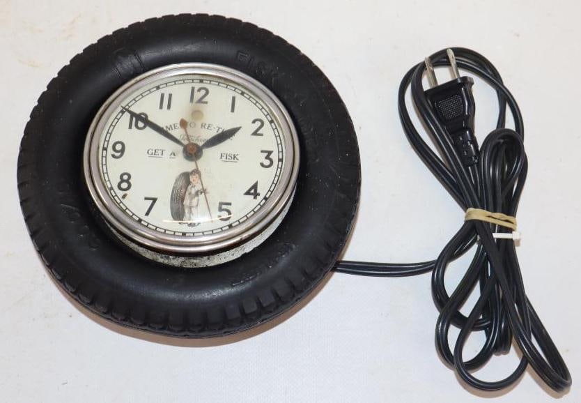 Fisk Time to Re-Tire Tire Shaped Clock: Is in working condition. 6.5" x 6.5" x 2"