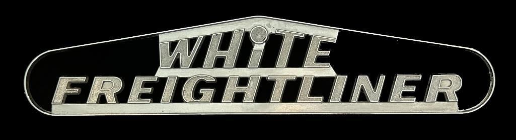 White Freightliner Cab Script Emblem: 1951 - 74 White Freightliner Cab Script Emblem. This emblem measures approximately 10.75" wide by 2.4" high.