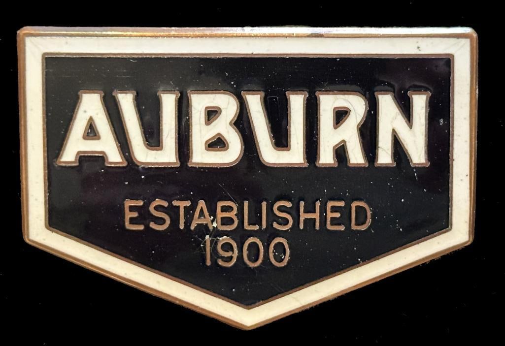 Auburn Radiator Emblem: c1930 Auburn radiator emblem. This emblem measures approximately 2.75" wide by 1.8" high.