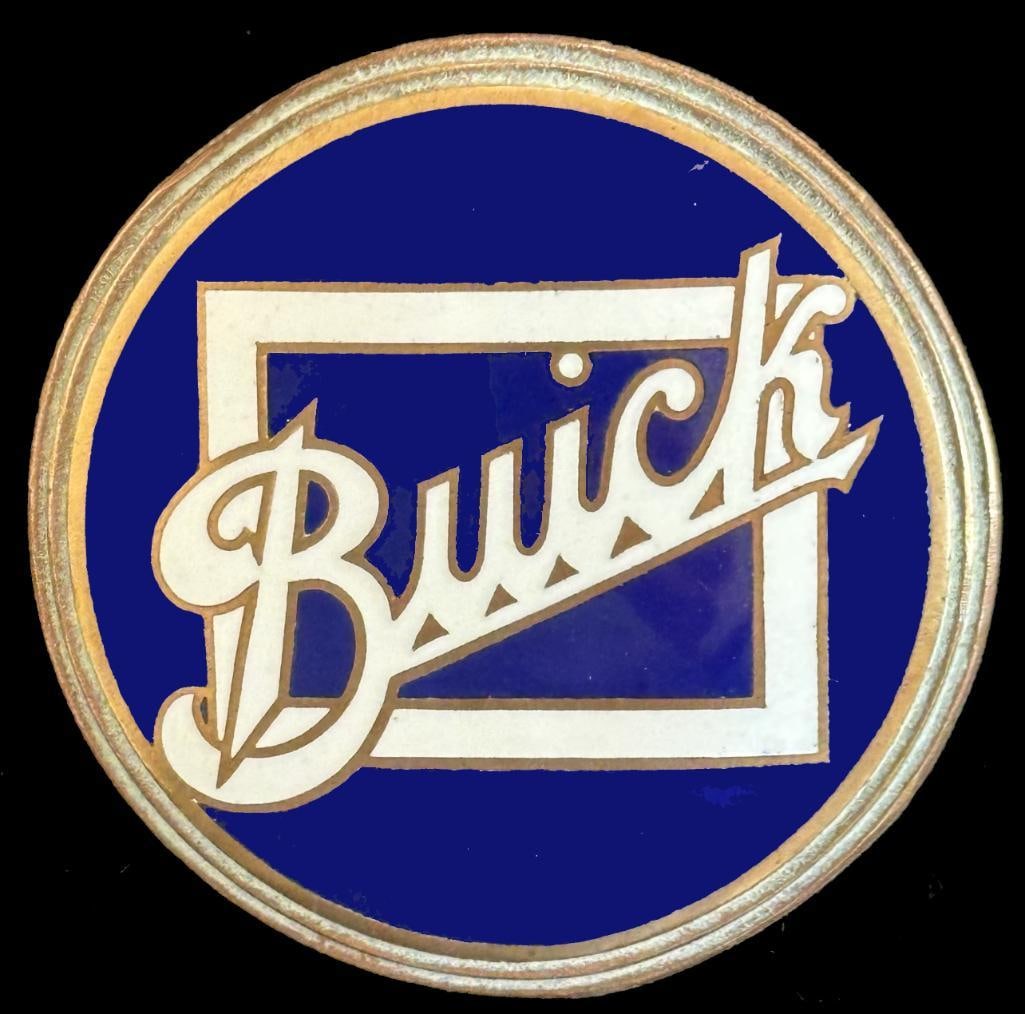 Buick Radiator Emblem: 1933 Buick radiator emblem. This emblem has a DL Auld maker's mark. It is rated scarce and measures approximately 1.8" in diameter.