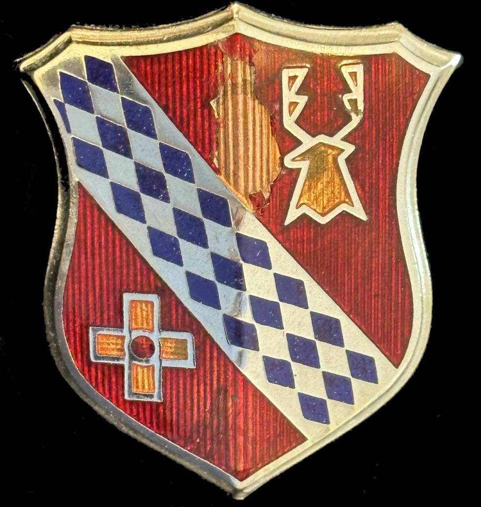 Buick Trunk Emblem: 1942 Buick trunk emblem. This emblem measures approximately 2.25" high by 2" wide.