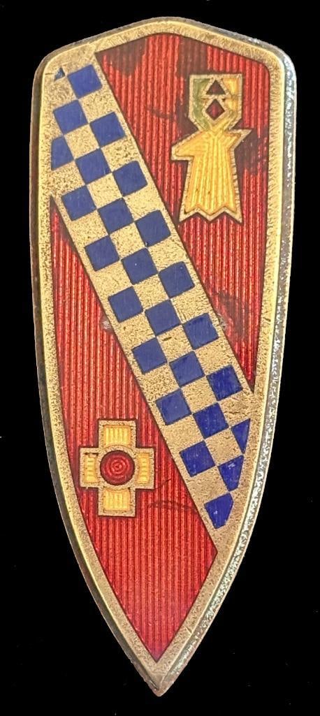 Buick Trunk Emblem: 1939 - 1941 Buick trunk emblem. This emblem has a Fox maker's mark and measures approximately 3.5" high by 1.4" wide.