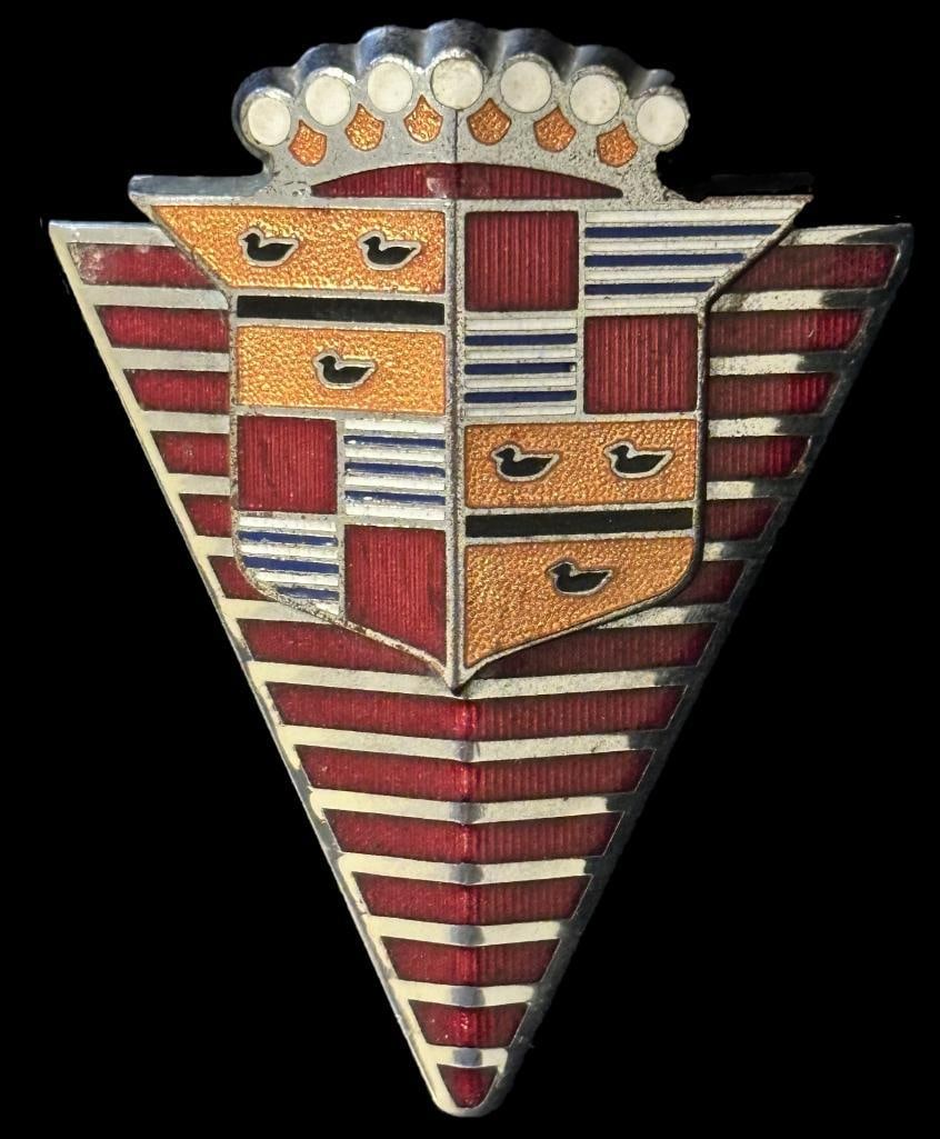 Cadillac Hood Emblem: 1947 Cadillac hood emblem. This emblem measures approximately 3.75" high by 3" wide.