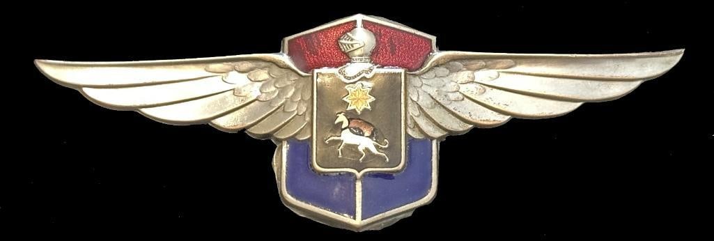 Cadillac La Salle Radiator Emblem: 1927 - 1930 Cadillac La Salle radiator emblem. The emblem has a DL Auld maker's mark and measures approximately 5.25" wide by 1.75" high