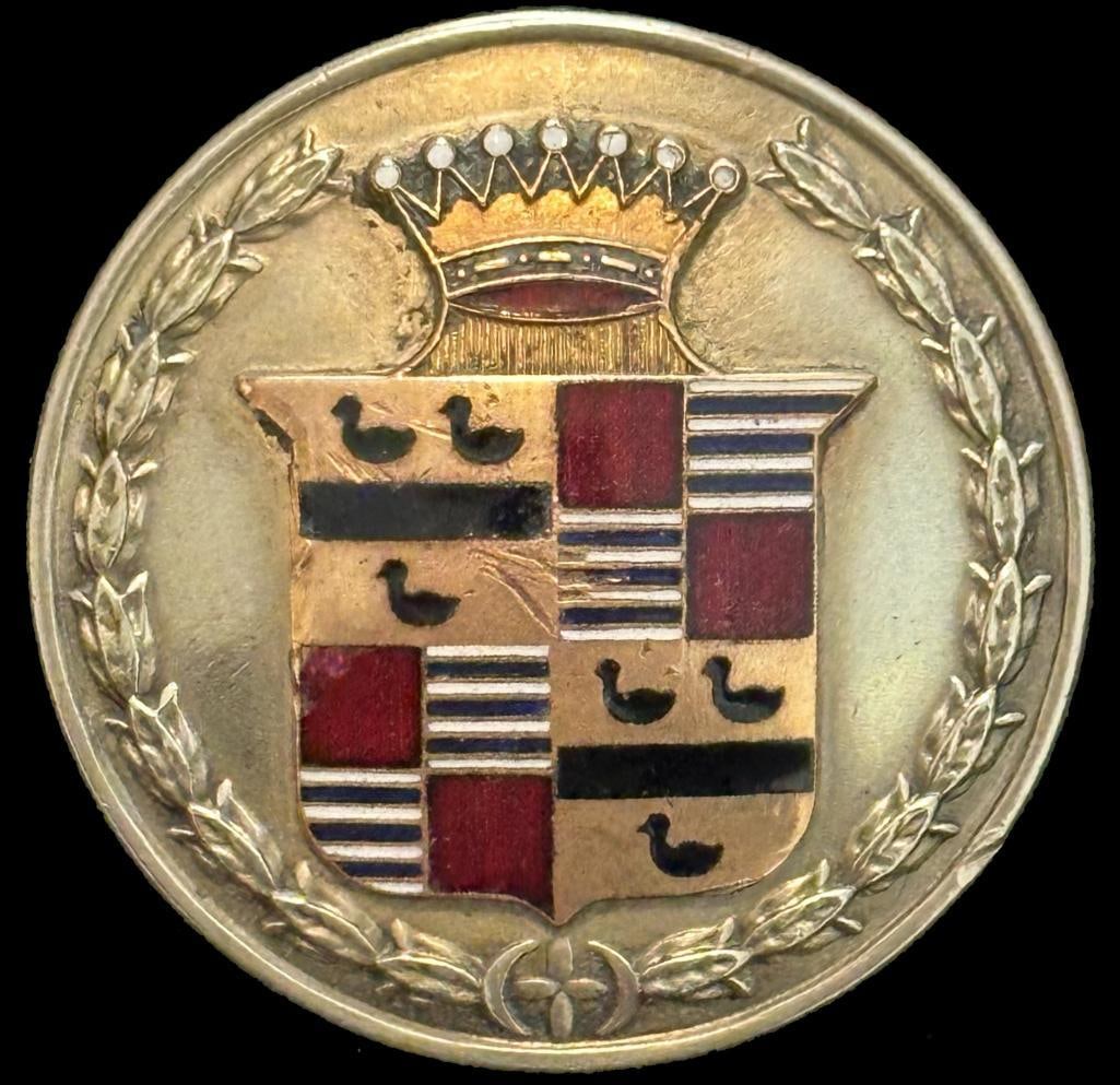 Cadillac Radiator Emblem: 1920 - 1925 Cadillac radiator emblem. This emblem measures approximately 2.2" in diameter.
