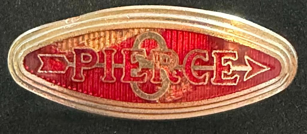 Pierce Dashboard Emblem: 1932 - 1935 Pierce dashboard emblem. This emblem has a DL Auld maker's mark and measures approximately 1.75" wide by .75" high.