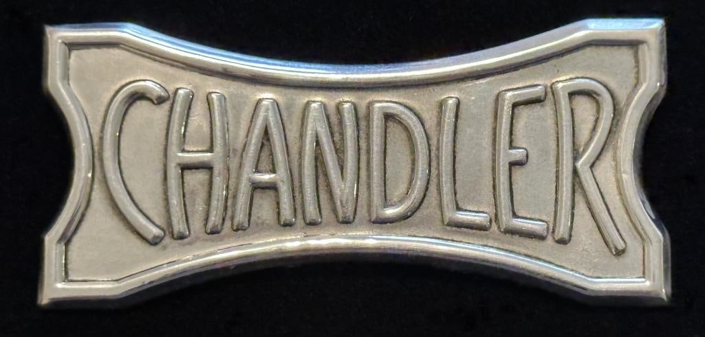Chandler Emblem: Chandler emblem. This emblem measures approximately 2.5" wide by 1.25" high.