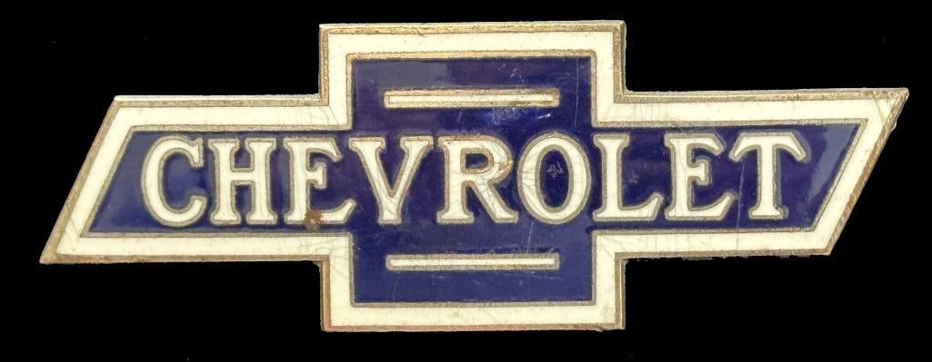 Chevrolet Radiator Emblem: 1915 - 1928 Chevrolet radiator emblem. This is the 2nd Chevrolet radiator emblem. This emblem measures approximately 4" wide by 1.5" high.