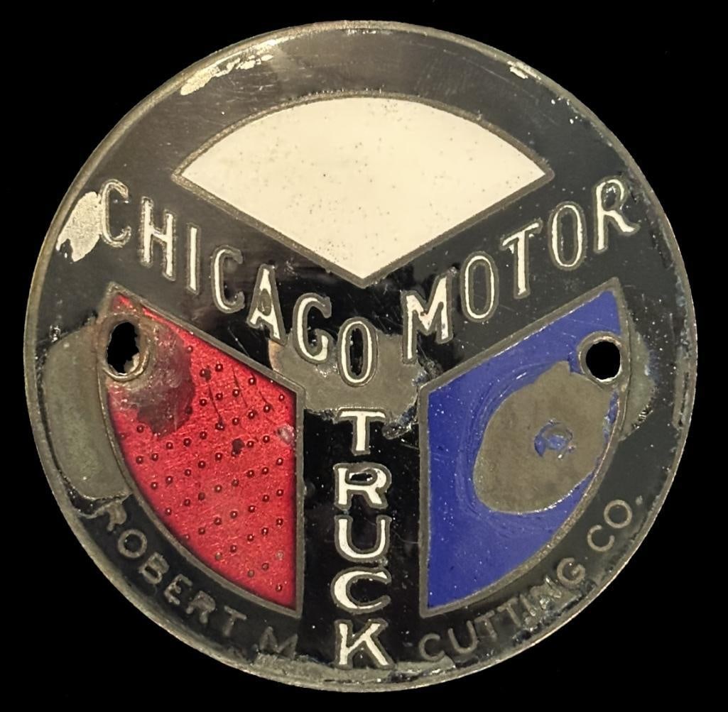 Chicago Motor Truck Radiator Emblem: c1920's Chicago Motor Truck radiator emblem. This emblem has a Grammes maker's mark. It s rated very rare and measures approximately 3" in diameter.