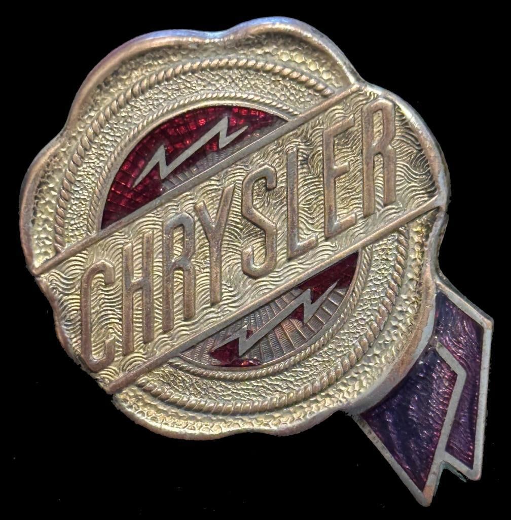 Chrysler Radiator Emblem: d1924 - 1926 Chrysler radiator emblem. This emblem has a Fox maker's mark and measures approximately 2" in diameter.