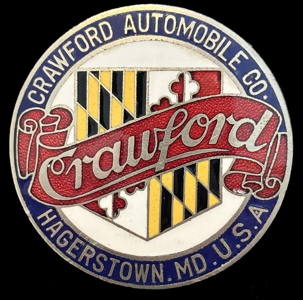 Crawford Radiator Emblem: c1920 - 1923 Crawford radiator emblem. This emblem looks to be New Old Stock (NOS) and has a Fox maker's mark on the back. It is rated very rare and measures approximately 2.25" in diameter.