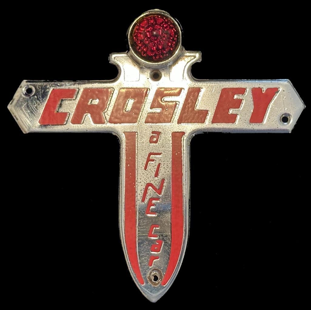 Crosley Trunk Emblem: 1946 - 1953 Crosley trunk emblem. This emblem is rated scarce and measures approximately 5" high by 5" wide.