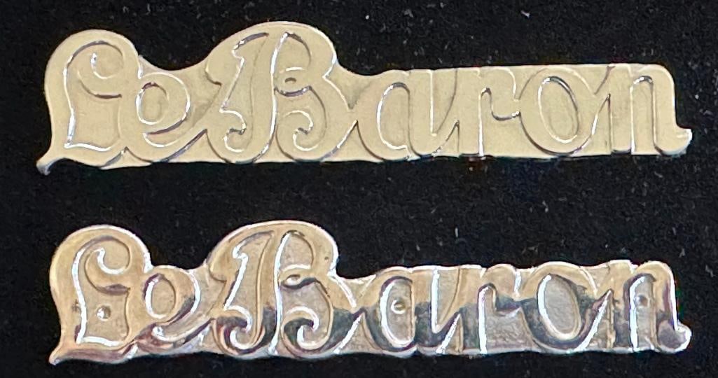 LeBaron Body Maker Plates: 1924 - 1953 LeBaron Body Maker Plates. Quantity 2. Each plate measures approximately 2.75" wide by .6" high.