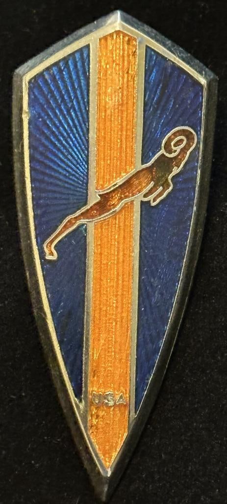 Dodge Radiator Emblem: 1940 Dodge radiator emblem. This emblem has a Ross-AD maker's mark and measures approximately 2.4" high by 1" wide.