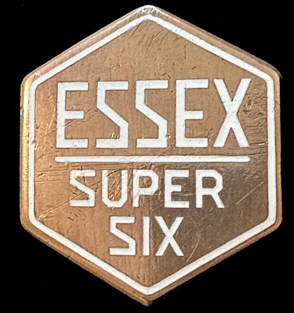 Essex Radiator Emblem: 1928 Essex radiator emblem. This emblem has a Robbins maker's mark and measures approximately 2" high by 1.75" wide.