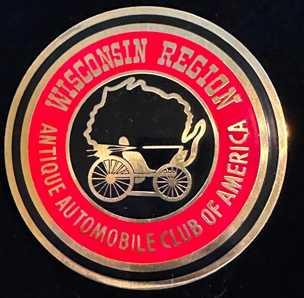 Wisconsin Region AACA Member Badge: Wisconsin Region AACA member badge. This item measures approximately 3.5" in diameter.