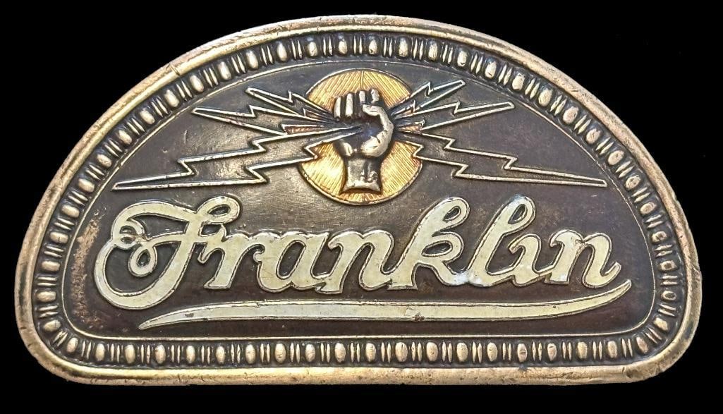 Franklin Radiator Emblem: 1922 Franklin radiator emblem. This emblem is rated rare and measures approximately 3.25" wide by 1.75" high.