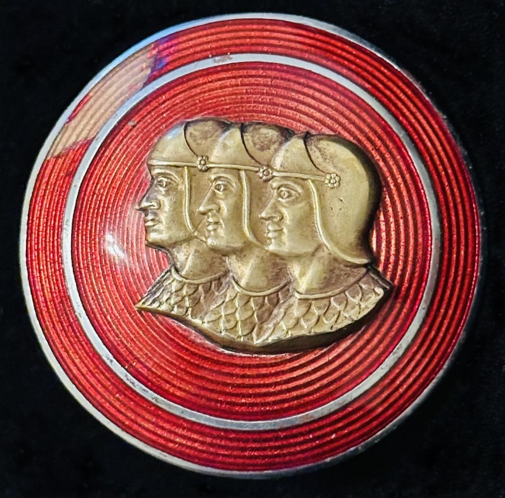 Graham Hood Ornament Emblem (Right side): 1937 Graham hood ornament emblem - right side. This emblem has a Fob maker's mark and measures approximately 2" in diameter.