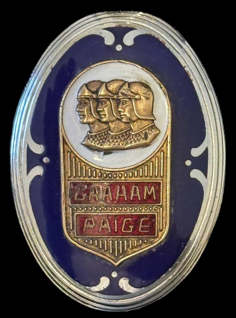 Graham-Paige Radiator Emblem: 1929 Graham-Paige radiator emblem. This emblem measures approximately 2.25" high by 1.6" wide.