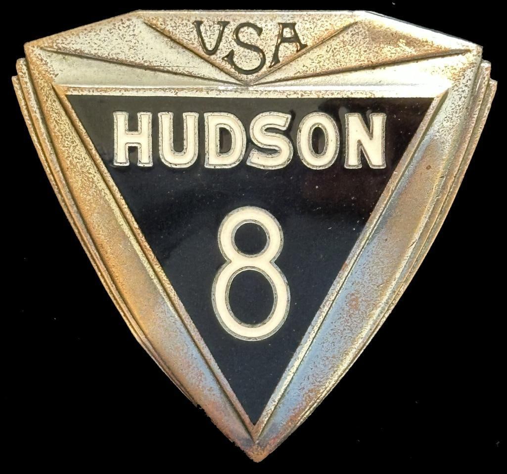 Hudson 8 Radiator Emblem: 1930 - 1931 Hudson 8 radiator emblem. This emblem measures approximately 2.6" wide by 2.4" high.