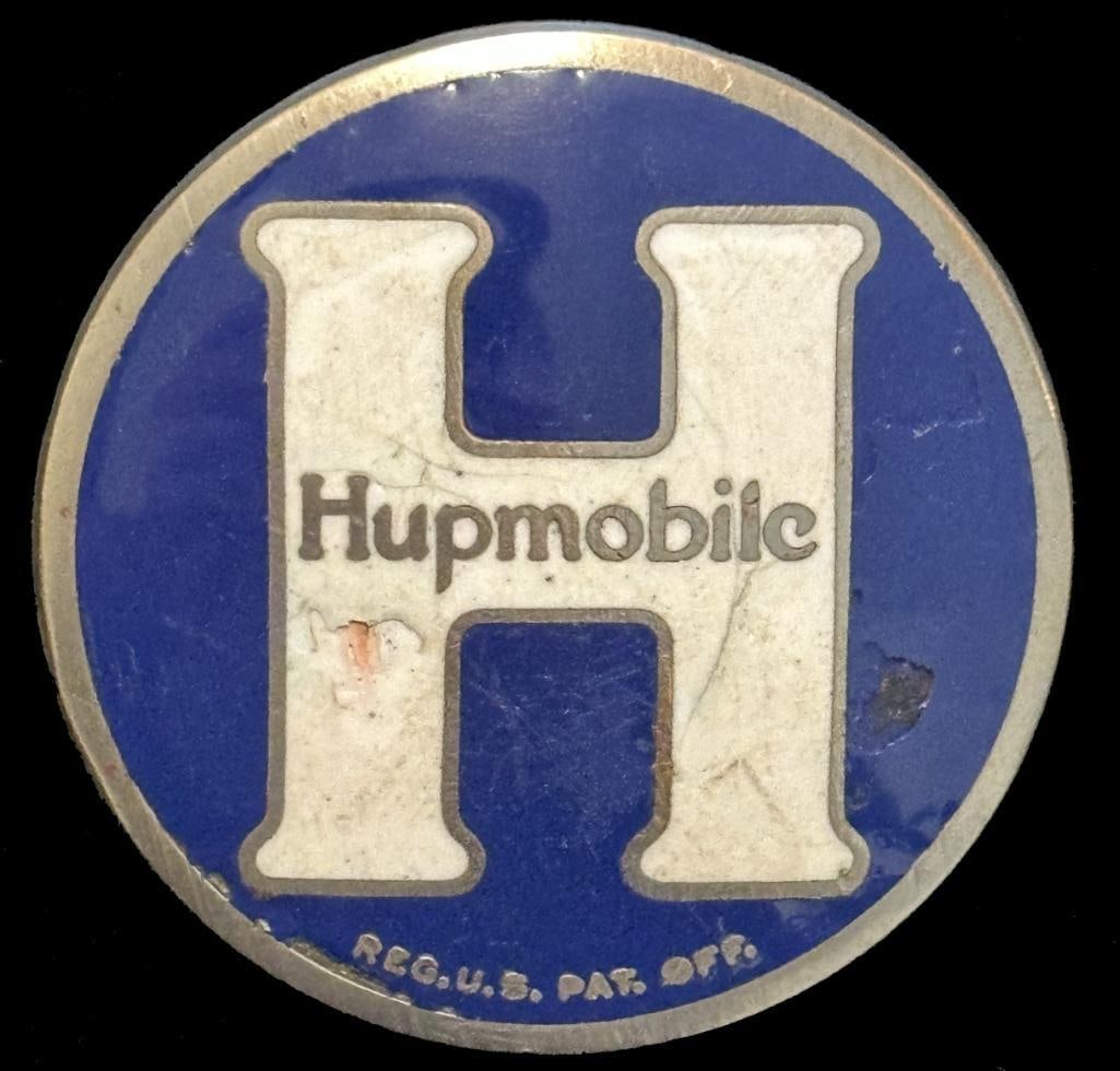 Hupmobile Radiator Emblem: 1918 - 1925 Hupmobile radiator emblem. This emblem has a DL Auld maker's mark and measures approximately 2" in diameter.