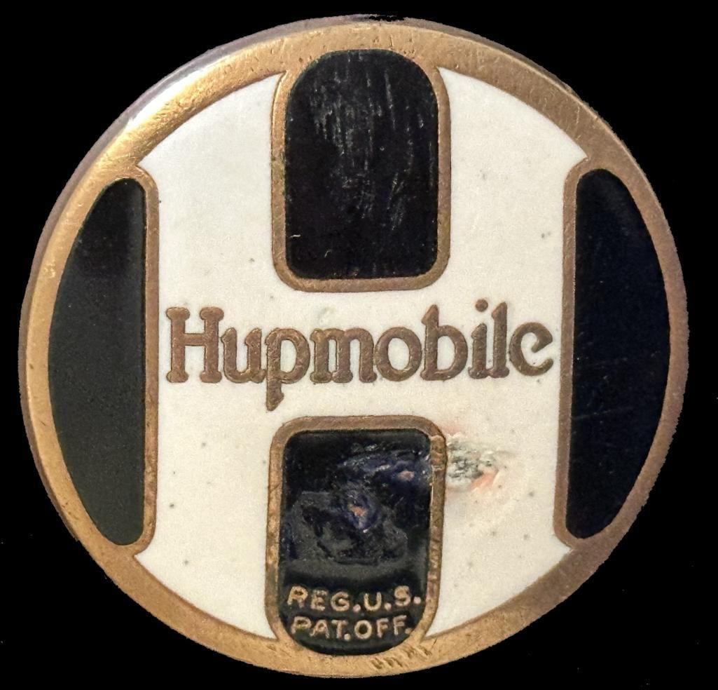 Hupmobile Radiator Emblem: 1926 Hupmobile Radiator Emblem. This emblem has a DL Auld maker's mark and measures approximately 1.75" in diameter.