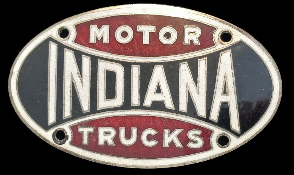 Indiana Motor Trucks Radiator Emblem: c1923 - 1930 Indiana Motor Trucks radiator emblem. This emblem has a SD Childs maker's mark. It is rated rare and measures approximately 4" wide by 2.5" high.