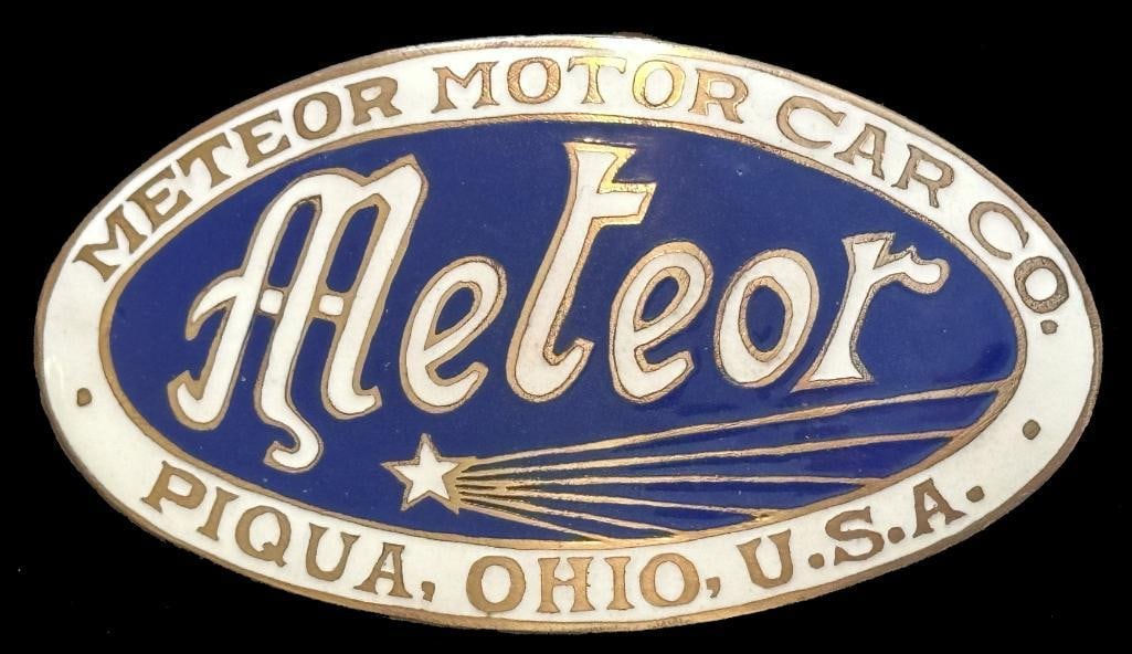 Meteor Radiator Emblem: c1918 - 1922 Meteor radiator emblem. This emblem measures approximately 3.3" wide by 1.75" high.