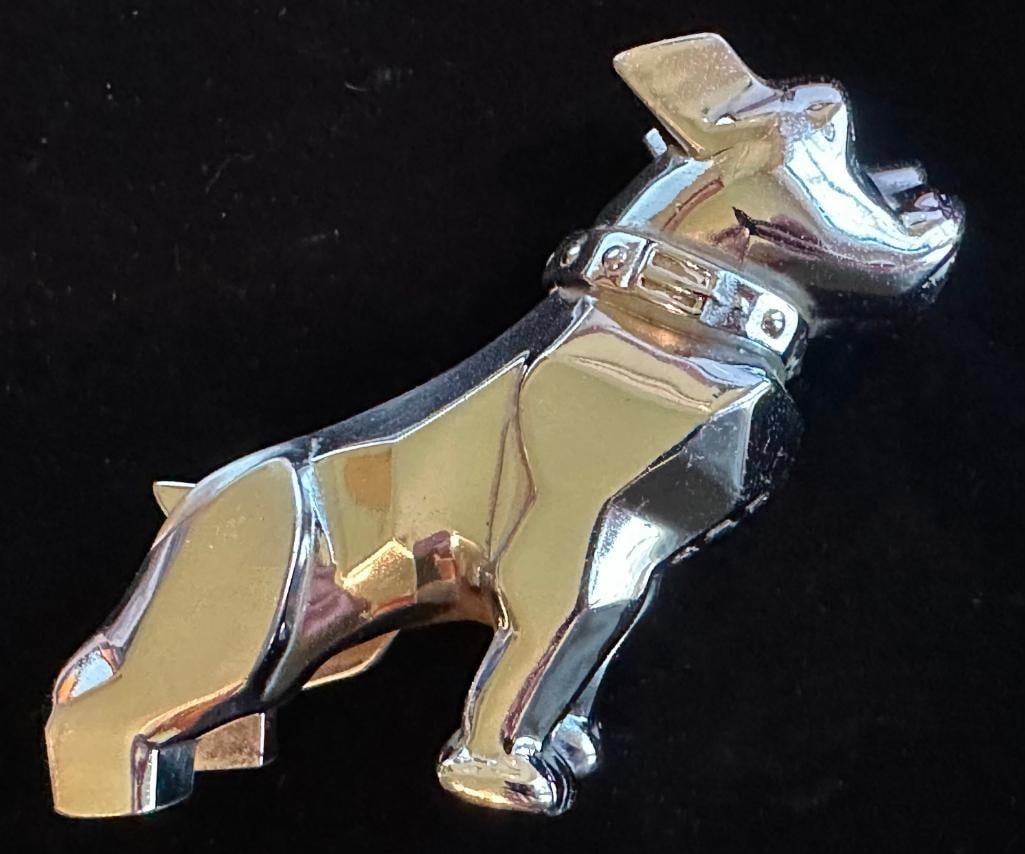 Mack Bulldog Ornament Mascot: Mack Bulldog Ornament Mascot. This item measures approximately 4.5" by 4.5". The legs look to have been cut off so the mascot could stand.