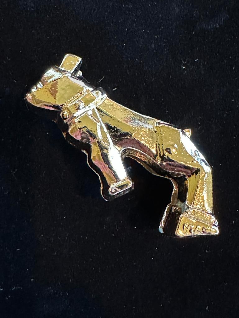 Mack Bulldog Ornament Mascot (small): Mack Bulldog Ornament Mascot (small). This item measures approximately 2" high by 2" wide.