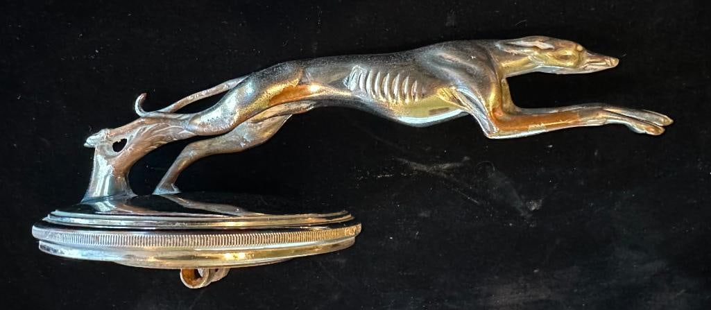 Lincoln Radiator Mascot: 1932 - 1934 Lincoln Radiator Cap and Mascot. This item measures approximately 9" wide and 3" high.