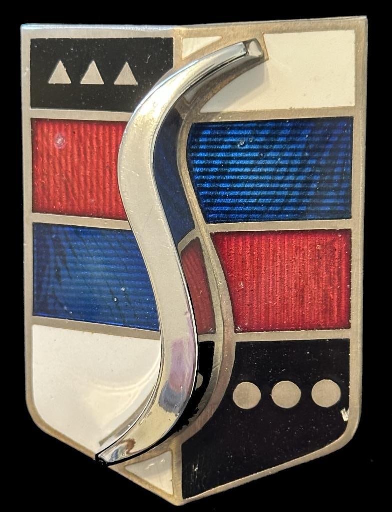 Studebaker Hood Emblem: 1947 - 1948 Studebaker hood emblem. This emblem measures approximately 3.3" high by 2.5" wide.