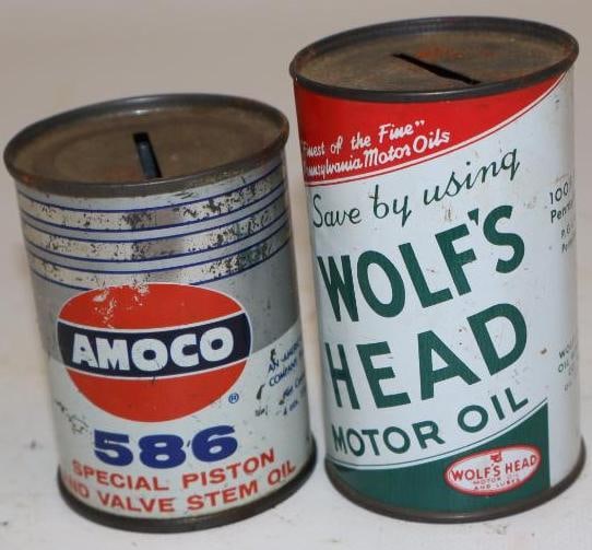Group of 2 Wolf's Head and Amoco Oil Can Shaped Coin Banks: Largest is 2" x 2" x 3.25"