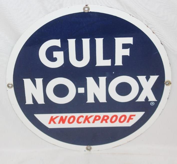 Gulf No-Nox Knockproof Porcelain Pump Plate Sign: This sign has some light surface wear and scratches but has great color and gloss. It measures 10.5" x 10.5" and is graded an 8.9.