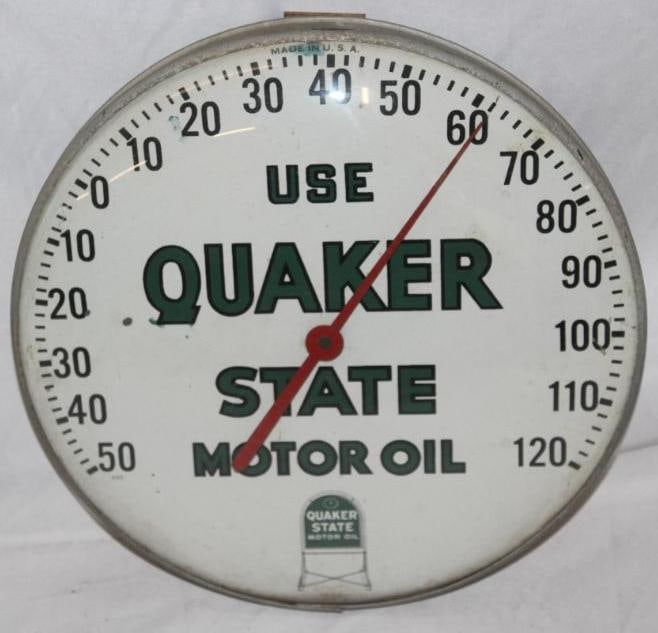 Use Quaker State Motor Oil Advertising Thermometer: This thermometer is in working condition with glass outer face. It shows bright colors with some minor wear to the dial. This thermometer measures 12" x 12" and is graded 8.25.