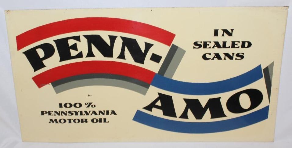 Penn-Amo Amoco SST Oil Can Rack Sign: This sign is in very good overall condition with great color and gloss. There are a couple minor surface scratches. This sign measures 11.5" x 21.5" and is graded an 8.9.